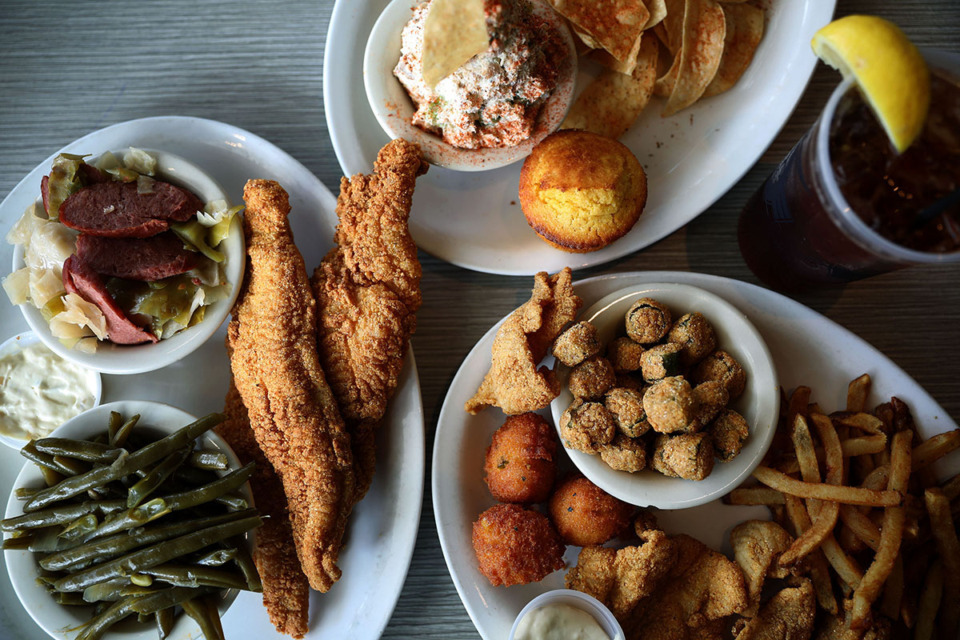 <strong>The thin and crispy catfish, fried okra, catfish dip are among some of the more popular items on the menu at Soul Fish Cafe.</strong> (Houston Cofield/The Daily Memphian file)