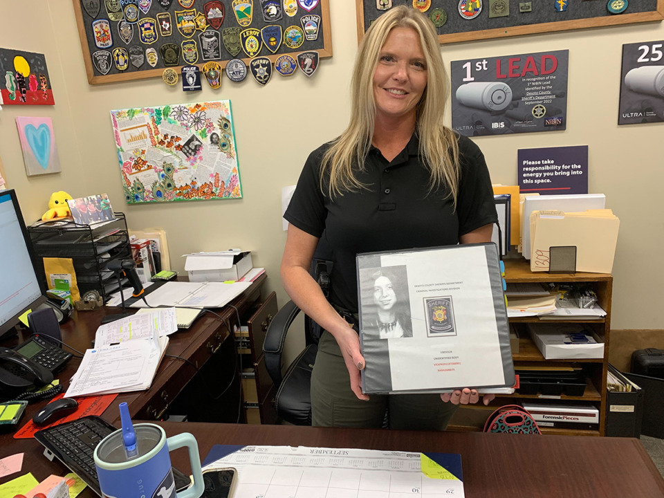 <strong>Here&rsquo;s a hint for No. 8 Across:</strong>&nbsp;<strong>Amber Edlin, a crime scene technician with the DeSoto County Sheriff&rsquo;s Office holds the case history binder for Lorie Ann Mealer Pennell, a &ldquo;Jane Doe&rdquo; for more than 40 years until Edlin solved the mystery.</strong>&nbsp;(Rob Moore/The Daily Memphian)