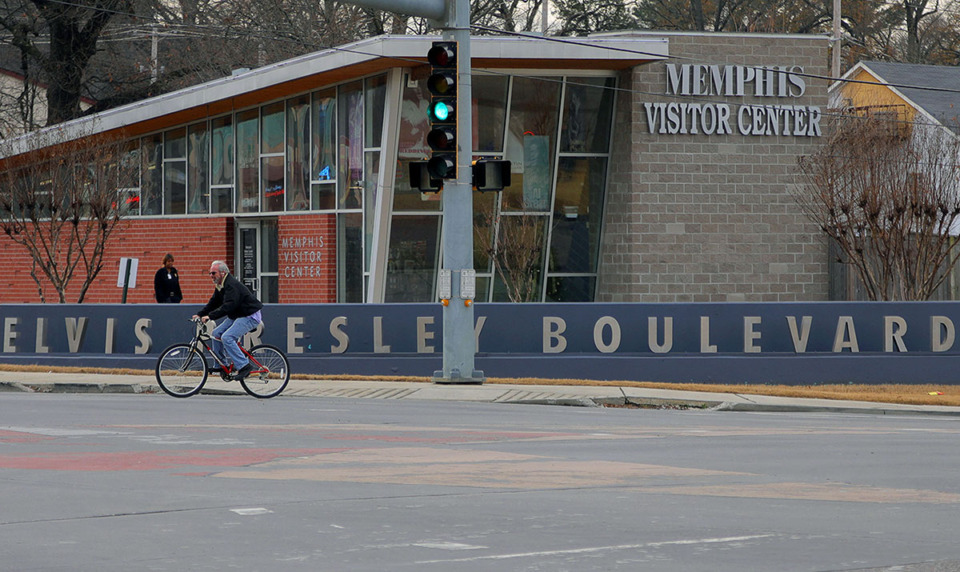 <strong>A man rides his bicycle through the intersection of Elvis Presley Boulevard and Brooks Road in Whitehaven Dec. 27, 2019.</strong> (Patrick Lantrip/The Daily Memphian file)