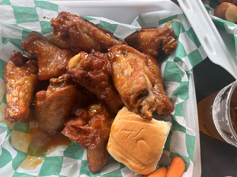 <strong>Fans of the now-closed New Wing Order food truck can still get their hot wing fix, including the Grind City honey gold flavored wings, at Ghost River Brewing Co.&rsquo;s taprooms</strong>. (Holly Whitfield/The Daily Memphian)