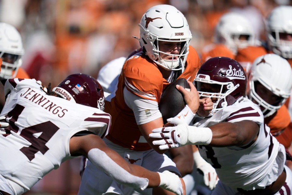 <strong>Texas quarterback Arch Manning (16) is hit by Mississippi State linebacker Branden Jennings (44) on a keeper during the first half of an NCAA college football game in Austin, Texas, Saturday, Sept. 28, 2024.</strong> (Eric Gay/AP)