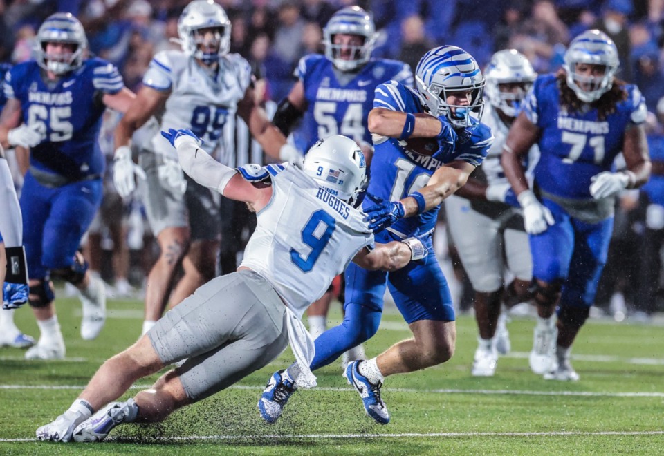 <strong>Memphis receiver Koby Drake (10) breaks a tackle during a Sept. 28, 2024 game against MTSU.</strong> (Patrick Lantrip/The Daily Memphian)