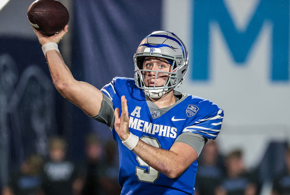 <strong>University of Memphis quarterback Seth Henigan (9) throws the ball during a Sept. 28 game against MTSU.</strong> (Patrick Lantrip/The Daily Memphian)