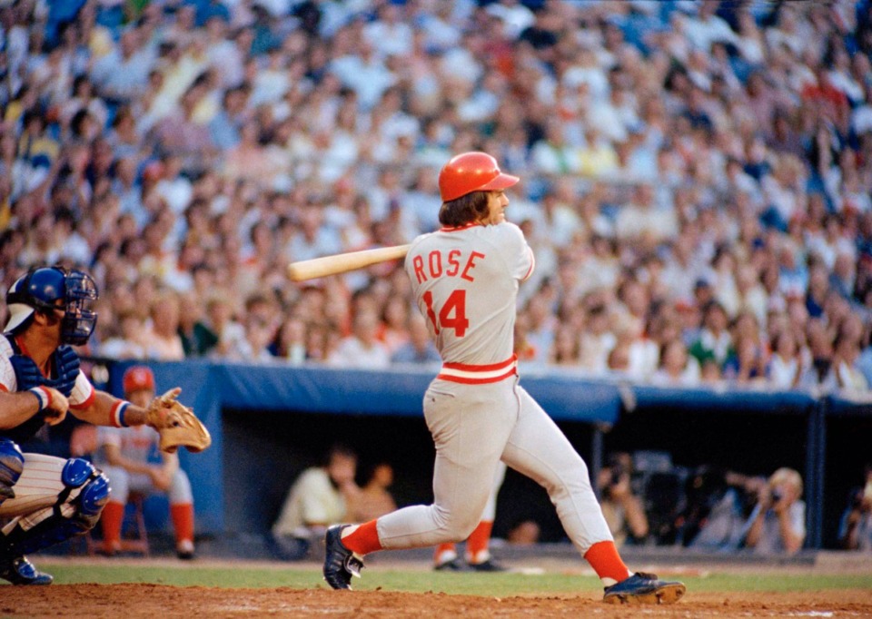 <strong>Pete Rose of the Cincinnati Reds gets a hit against the Atlanta Braves in Atlanta, Aug. 2, 1978.</strong> (AP file)