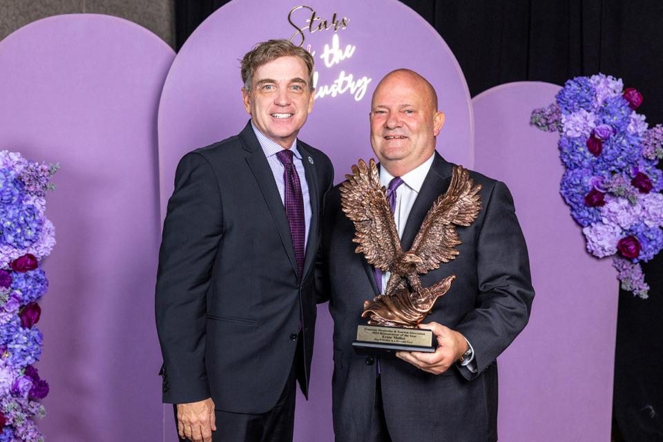 <strong>Ernie Mellor, owner of Hog Wild-Real Memphis Barbecue and A Moveable Feast, was named the 2024 Restaurateur of the Year by the Tennessee Hospitality &amp; Tourism Association. Mellor, on the right, is with Tennessee Department of Tourist Development Commissioner Mark Ezell.</strong> (Courtesy Odinn Media)