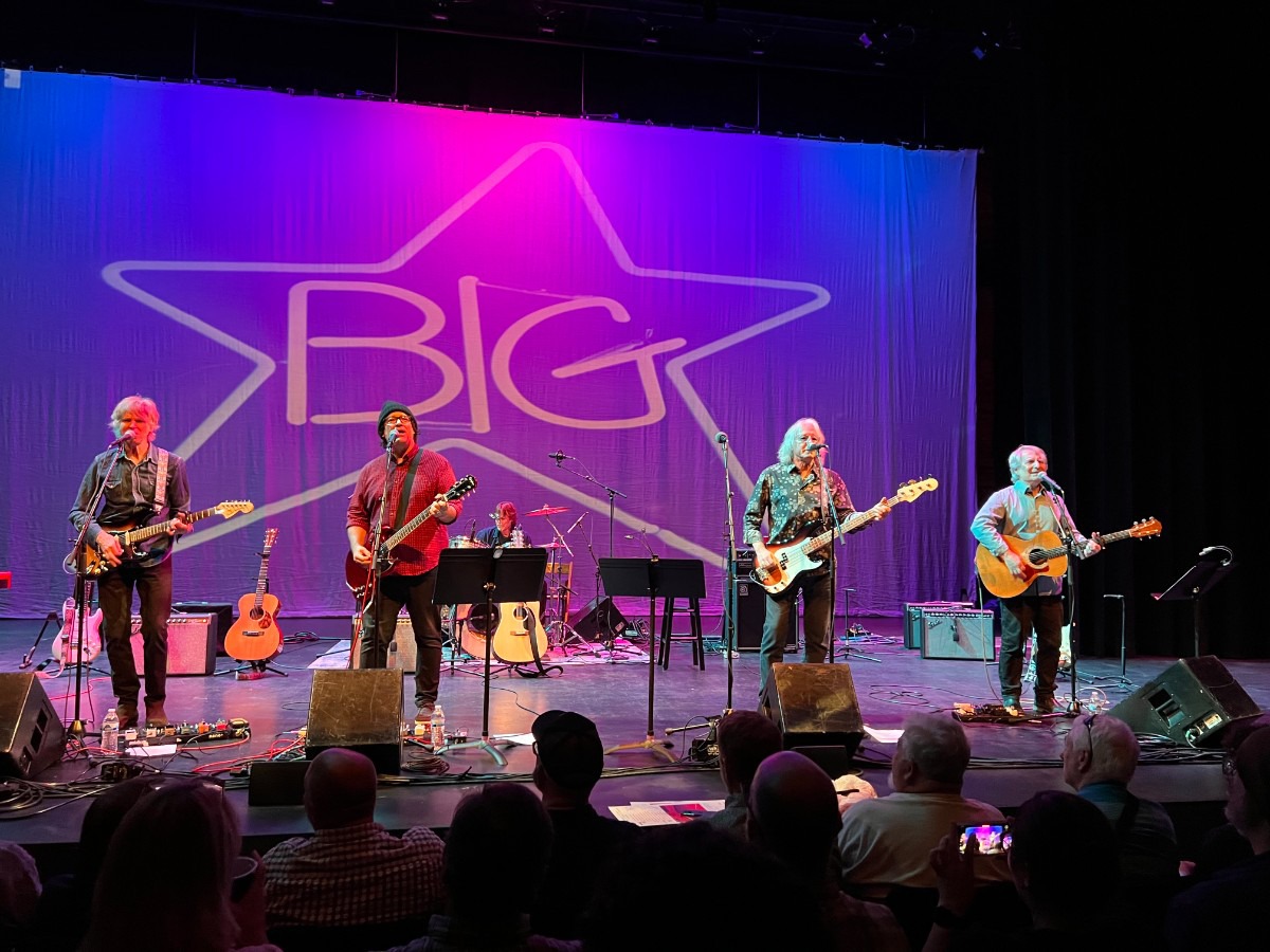 <strong>Jody Stephens (background, on drums), played with Alex Chilton in Big Star and the Box Tops. He is joined on stage at the Crosstown Theater by (foreground, from left)</strong>&nbsp;<strong>Pat Sansone, Jon Auer, Mike Mills and Chris Stamey.</strong> (Jody Callahan/The Daily Memphian)