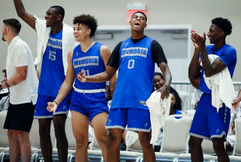 <strong>Memphis Tigers teammates (left to right) Lance Thomas, Lester Quinones, DJ Jeffries and Damion Baugh celebrate their win over Raw Talent Elite in the Bahamas Sunday, Aug. 18, but now the party's over.</strong> (Mark Weber/Daily Memphian)