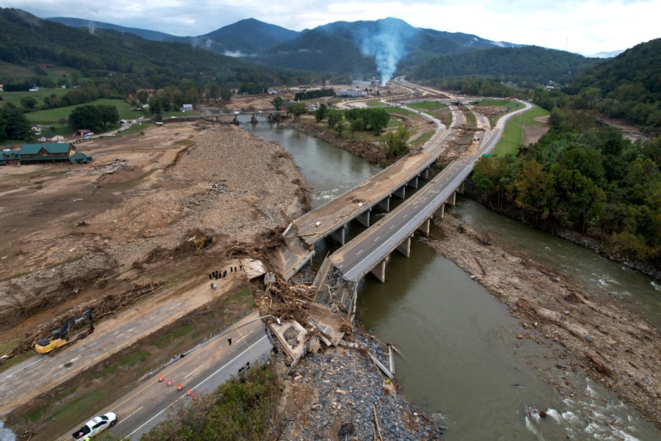 <strong>A bridge along Interstate 26 is destroyed in the aftermath of Hurricane Helene Friday, Oct. 4, 2024, in Erwin, Tenn.</strong> (AP Photo/Jeff Roberson)