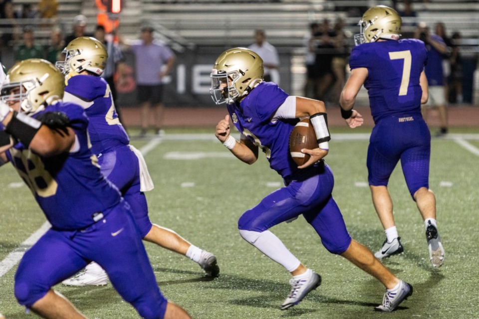 <strong>CBHS&rsquo; William Kreitz runs with the ball during a Briarcrest at CBHS football game.</strong> (Brad Vest/Speical to The Daily Memphian file)