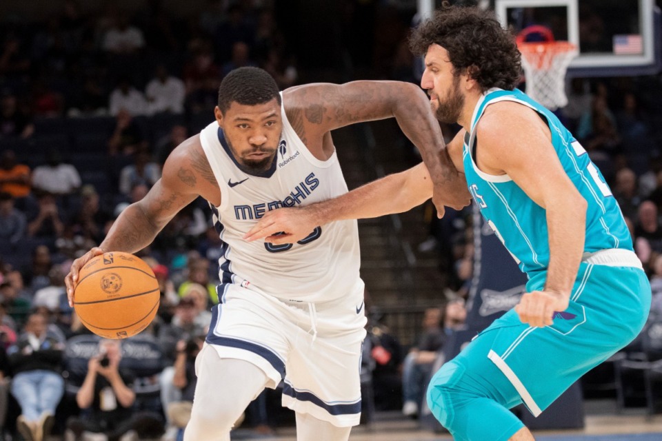 <strong>Memphis Grizzlies guard Marcus Smart (36) works against the defense of Charlotte Hornets guard Vasilije Micic (22), of Serbia, in the first half of a preseason NBA basketball game Thursday, Oct. 10, 2024.</strong> (Nikki Boertman/AP)