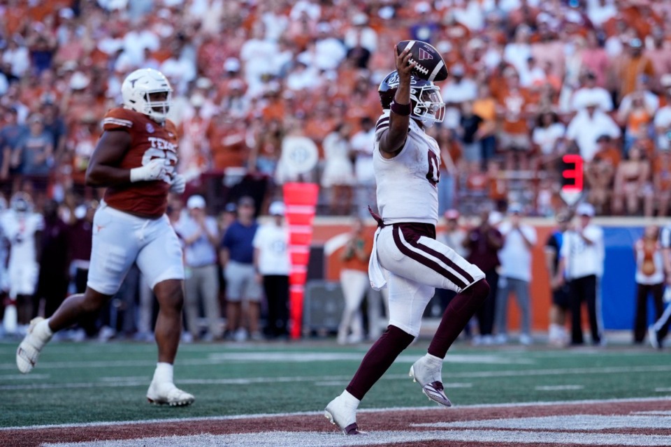 <strong>Mississippi State quarterback Michael Van Buren Jr. (0) scores a touchdown against Texas during the second half of an NCAA college football game in Austin, Texas, Saturday, Sept. 28, 2024.</strong> (AP Photo/Eric Gay)