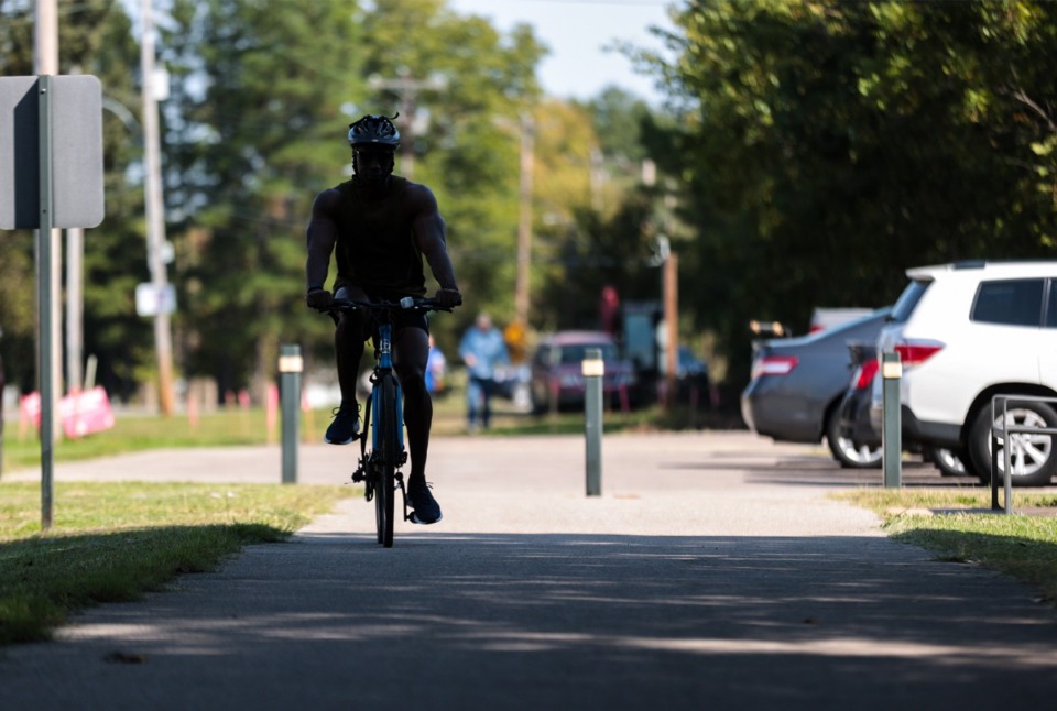 <strong>Travonne Brooks from Oakland, Tennessee gets on the Shelby Farms Greenline at it's current easternmost terminus in Cordova Oct. 10, 2024.</strong> (Patrick Lantrip/The Daily Memphian)