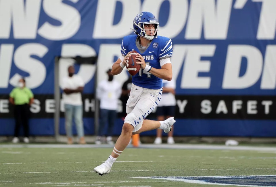 <strong>Memphis quarterback Seth Henigan&rsquo;s&nbsp;41-game streak of games with at least one touchdown pass is tied for the second-longest in FBS history.</strong> (Joe Murphy/Memphis Athletics)