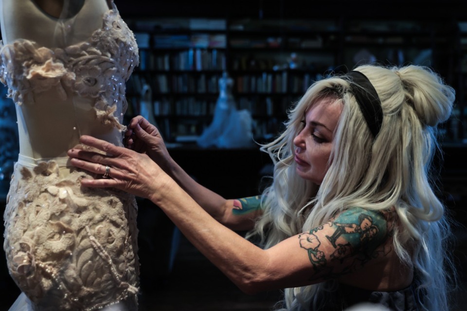 <strong>Local artist Sonin Lee works on a dress at her West Memphis, Arkansas studio Oct. 9, 2024.</strong> (Patrick Lantrip/The Daily Memphian)