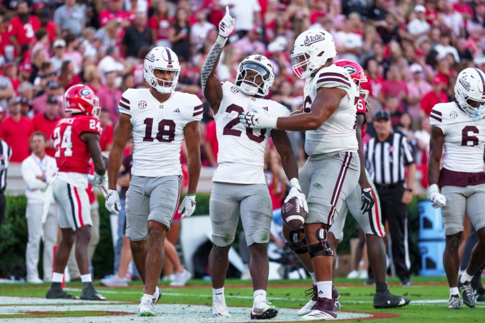 <strong>Mississippi State running back Johnnie Daniels (20) celebrates after scoring a touchdown during an NCAA college football game against Georgia, Saturday, Oct. 12, 2024, in Athens, Ga.</strong> (Jason Allen/AP)