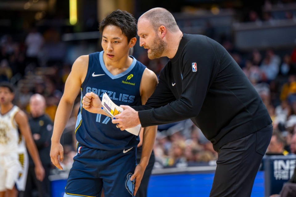 <strong>Memphis Grizzlies head coach Taylor Jenkins talks with guard Yuki Kawamura during a break in the game against the Indiana Pacers in Indianapolis, Monday, Oct. 14, 2024.</strong> (Doug McSchooler/AP)