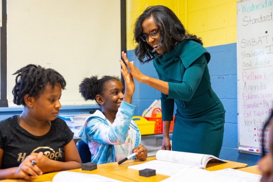 <strong>Memphis-Shelby County Schools Superintendent Marie Feagins high fives students during Gov. Bill Lee's visit to the Winchester Elementary&rsquo;s summer program June 12, 2024.</strong> (Benjamin Naylor/The Daily Memphian file)