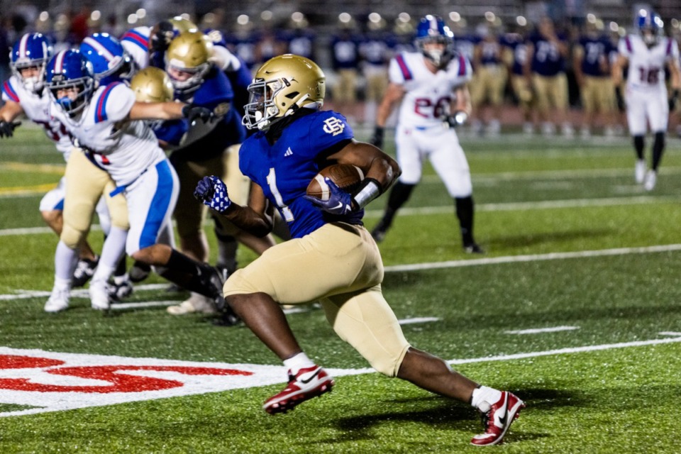 <strong>CBHS&rsquo; Ethan Johnson runs against MUS on Friday, Oct. 18, 2024. Johnson, who scored three TDs, finished with 222 yards on 29 carries.&nbsp;</strong>(Brad Vest/Special to The Daily Memphian