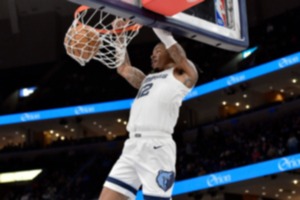 <strong>Memphis Grizzlies guard Ja Morant dunks against the Miami Heat in a preseason game on Friday, Oct. 18, 2024.</strong> (Brandon Dill/AP)