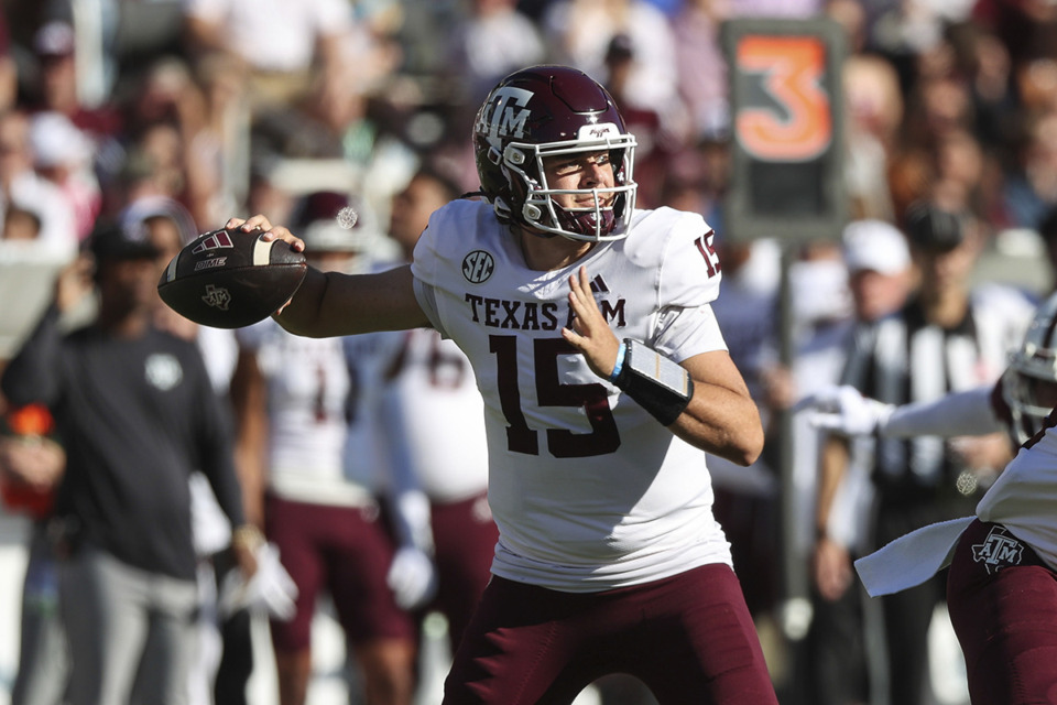 <strong>Texas A&amp;M quarterback Conner Weigman (15) throws the ball during the first half of an NCAA college football game against Mississippi State on Saturday, Oct. 19, 2024, in Starkville, Miss.</strong> (Randy J. Williams/AP Photo)