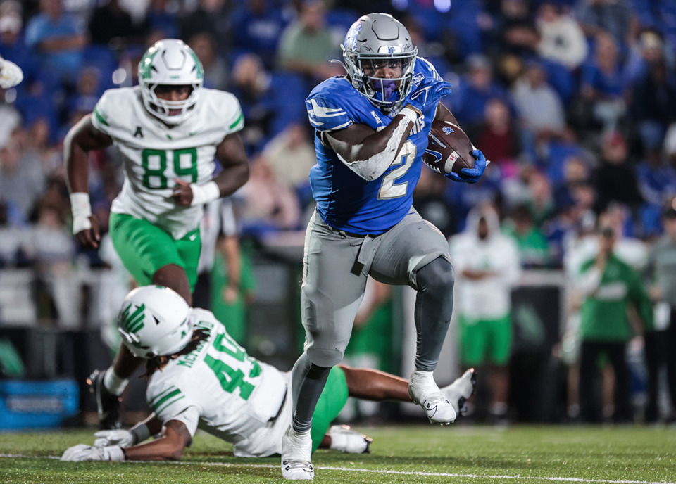 <strong>Memphis running back Mario Anderson (2) runs through a defender during a game against North Texas Oct. 19, 2024.</strong> (Patrick Lantrip/The Daily Memphian)