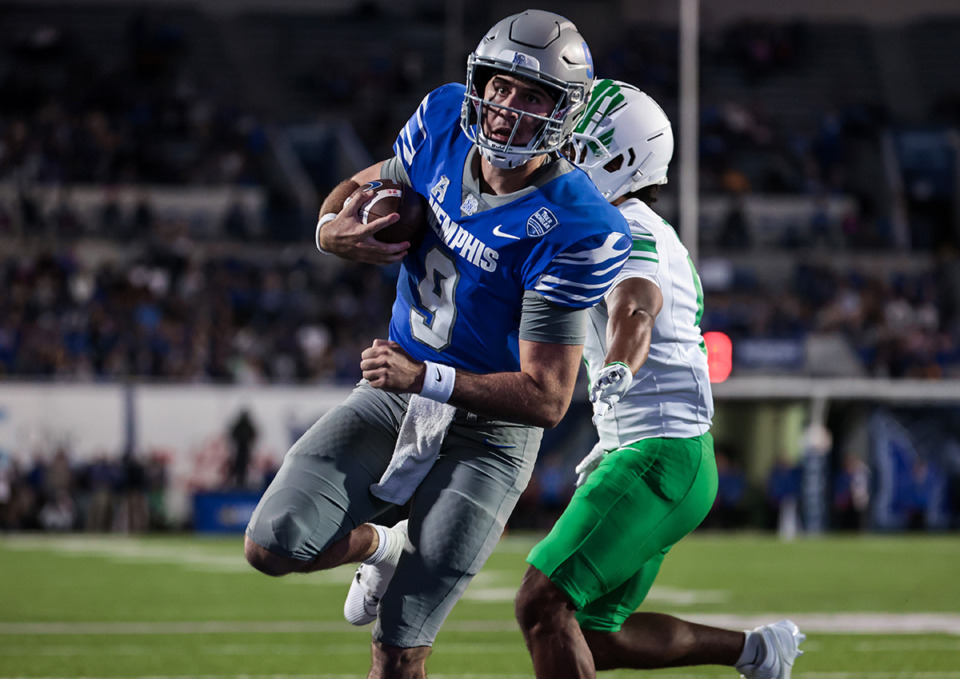 <strong>University of Memphis quarterback Seth Henigan (9) rushes for a touchdown during a game against North Texas Oct. 19, 2024.</strong> (Patrick Lantrip/The Daily Memphian)