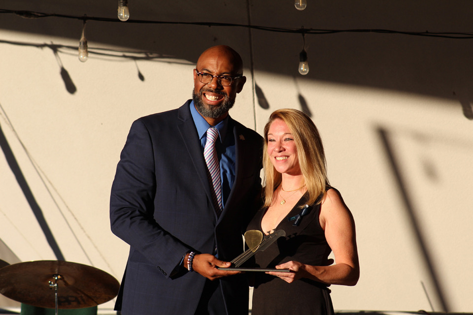 <strong>Marcus Cox presented Stacey Voyles with the Michelle Land Award.</strong> (Sophia Surrett/The Daily Memphian)