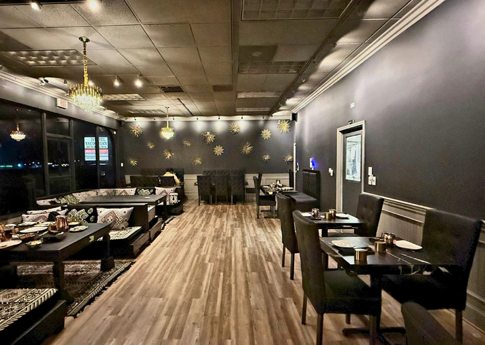 <strong>The interior of Swagath has stylized walls painted black, gray and red as well as black table tops and gold utensils.</strong> (Courtesy Swagath)