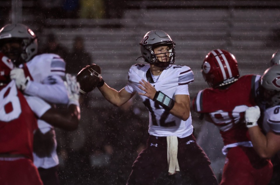 <strong>Collierville quarterback Grant Troutman (12), seen here Sept. 27, completed 14 of 15 passes against Cordova on Senior Night.</strong> (Patrick Lantrip/The Daily Memphian file)