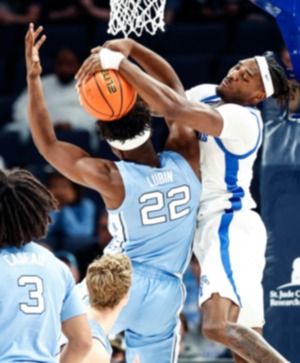 <strong>University of Memphis forward Tyreek Smith (right) battles for a rebound against North Carolina during action on Tuesday, Oct. 15, 2024.</strong> (Mark Weber/The Daily Memphian)