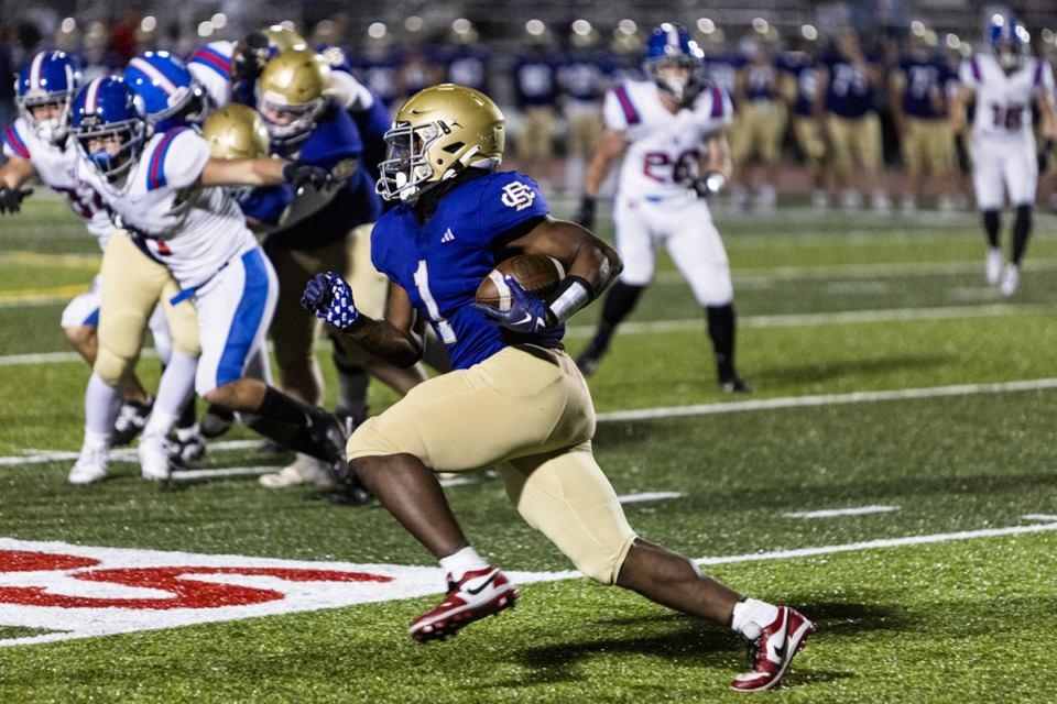 <strong>CBHS&rsquo;s Ethan Johnson runs with the ball during the MUS at CBHS football game.</strong> (Brad Vest/Special to The Daily Memphian)