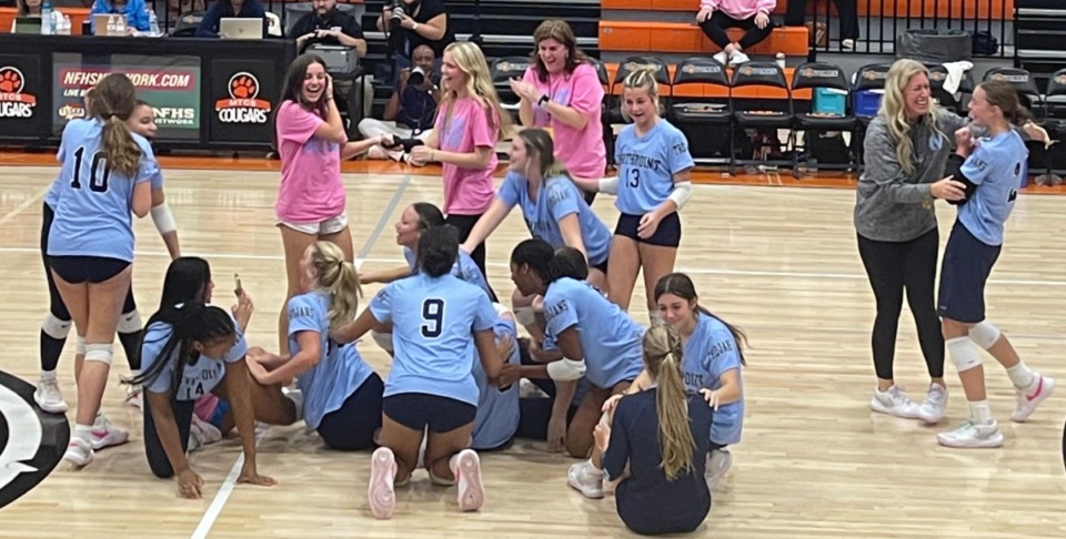 <strong>Northpoint volleyball celebrates after beating Battle Ground Academy for the state tile Thursday, Oct. 24, 2024.&nbsp;coach Kim Robinson is second from right.</strong> (John Varlas/The Daily Memphian)