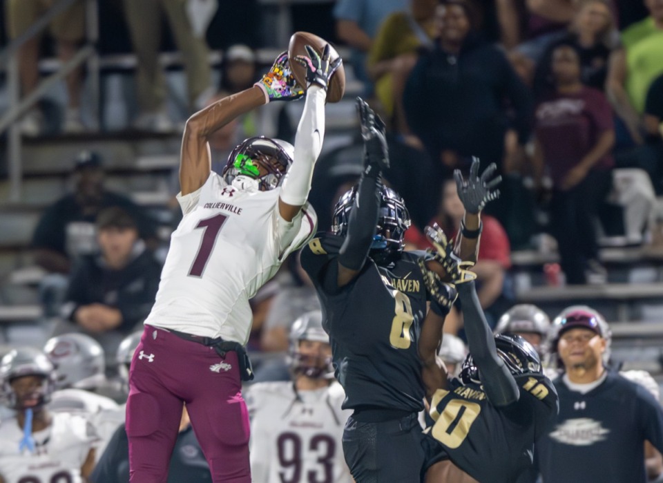 <strong>Collierville sophomore Tae Walden Jr. makes a reception over Whitehaven defenders at Whitehaven High School Friday, Oct. 25, 2024. Collierville won 27-6 and remains undefeated.</strong> (Greg Campbell/Special to The Daily Memphian)