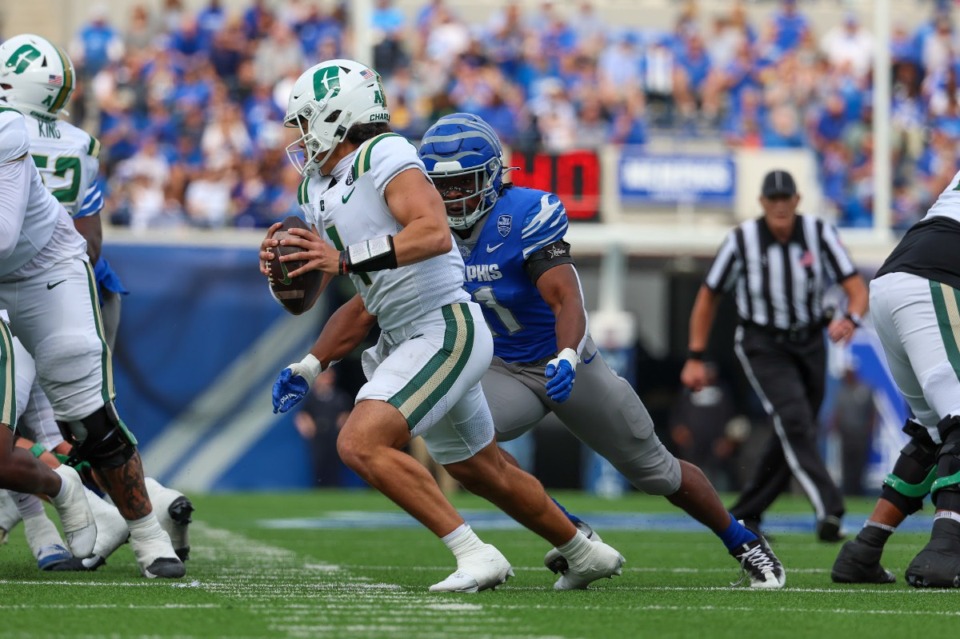 <strong>Memphis Tiger linebacker Chandler Martin (11) sacks Charlotte 49ers quarterback Max Brown (1) during the second quarter on Oct 26, 2024 at Simmons Bank Liberty Stadium.</strong> (Wes Hale/Special for The Daily Memphian)