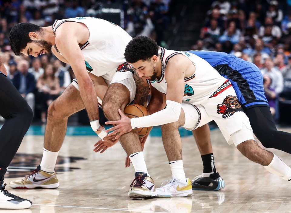 <strong>Memphis Grizzlies guard Scotty Pippen Jr. (middle) grabs a loose ball against the Orlando Magic during action on Saturday, Oct. 26, 2024.</strong> (Mark Weber/The Daily Memphian)