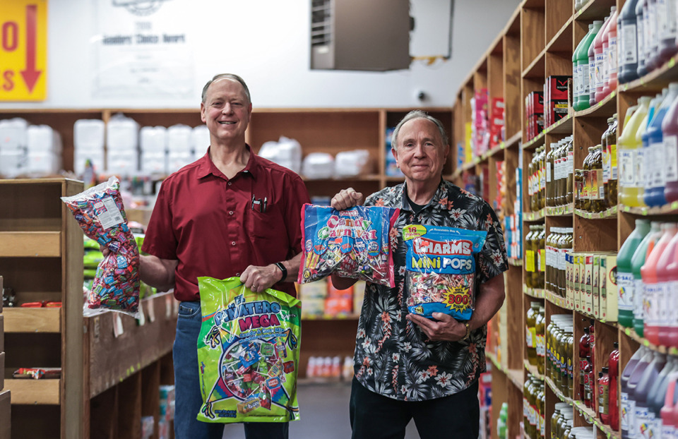 <strong>Owner Gary Wilkes (right) and nephew, Kelly Hardcastle sell sweets at Wayne's Candy Co., a candy shop in Downtown Memphis founded in 1947.</strong> (Patrick Lantrip/The Daily Memphian)