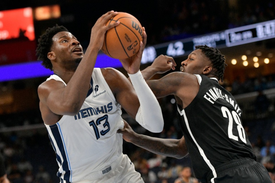 <strong>Memphis Grizzlies forward Jarenshootshandles the ball against Brooklyn Nets forward Dorian Finney-Smith (28) on Wednesday, Oct. 30, 2024.</strong> (Brandon Dill/AP)