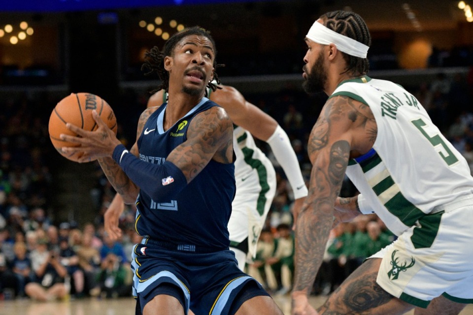 <strong>Memphis Grizzlies guard Ja Morant charges the paint against Milwaukee Bucks guard Gary Trent Jr. (5) Thursday, Oct. 31, 2024.</strong> (Brandon Dill/AP)