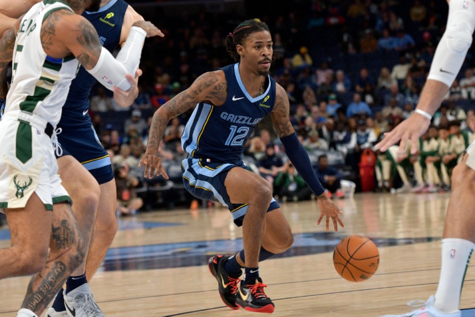 <strong>Memphis Grizzlies guard Ja Morant (12) looks for an opening against the Milwaukee Bucks Thursday, Oct. 31, 2024.</strong> (Brandon Dill/AP)