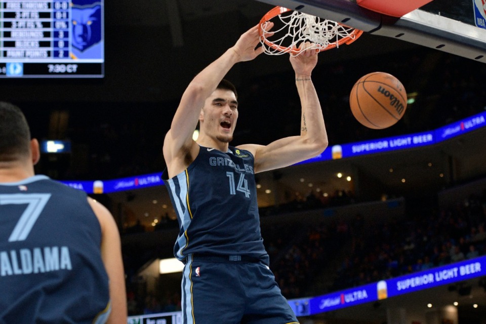 <strong>Memphis Grizzlies center Zach Edey (14) dunks against the Milwaukee Bucks Thursday, Oct. 31, 2024.</strong> (Brandon Dill/AP)