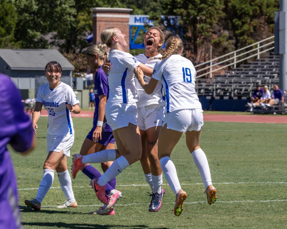 <strong>Ashley Henderson (4) of the Memphis Tigers celebrate a goal with teammates during the game between Memphis and Kansas State on Sunday, Sept. 8, 2024.</strong>&nbsp;(Wes Hale/Special to The Daily Memphian)