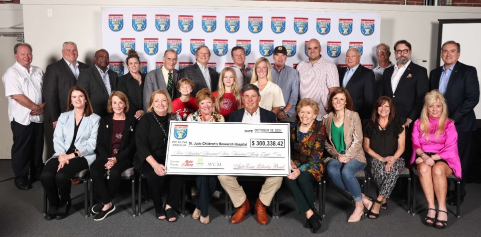 <strong>The AutoZone Liberty Bowl, in partnership with the College Football Playoff Foundation, presented a $300,338 check to St. Jude Children&rsquo;s Research Hospital.</strong> (Courtesy St. Jude Children&rsquo;s Research Hospital)