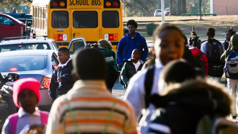 <strong>Students gather outside of a campus that&rsquo;s part of Tennessee's Achievement School District during the school turnaround program's early years in Memphis.</strong> (Kyle Kurlick/Chalkbeat)