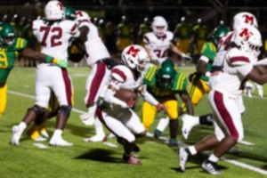 <strong>Munford&rsquo;s L.J. Daniel rushes through a clutch of Central defenders at Crump Stadium on Friday, Nov. 1, 2024.</strong> (Brad Vest/Special to The Daily Memphian)