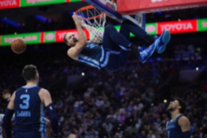 <strong>Memphis Grizzlies' Jay Huff reacts after a dunk during the second half of an NBA basketball game against the Philadelphia 76ers, Saturday, Nov. 2, 2024, in Philadelphia.</strong> (Matt Slocum/AP)