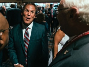 <strong>Tennessee Gov. Bill Lee (center) shakes hands during a reception at the Republican Party's annual Lincoln Day Gala. Politicians from across the state gathered at the University of Memphis Holiday Inn for a meet and greet and to hear Lee as the keynote speaker.</strong> (Houston Cofield/Special to the Daily Memphian)