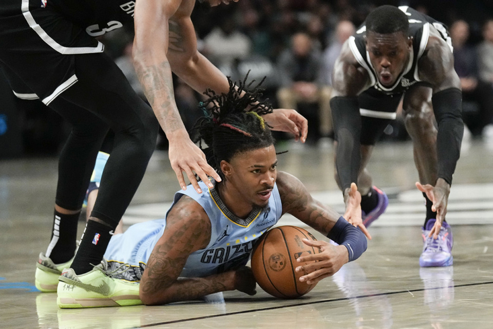 <strong>Memphis Grizzlies' Ja Morant is considered week-to-week after being injured in Wednesday&rsquo;s game against the Los Angeles Lakers.</strong>&nbsp;(Seth Wenig/AP file)