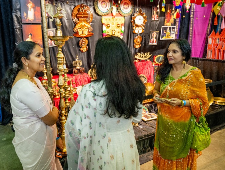 <strong>Sree Devi, Shilpa Nataraja and Pushpa Krishna discuss the display of a traditional culture in India Saturday, Nov. 9 at the IndiaFest at the Agricenter International.</strong> (Greg Campbell/Special to The Daily Memphian)