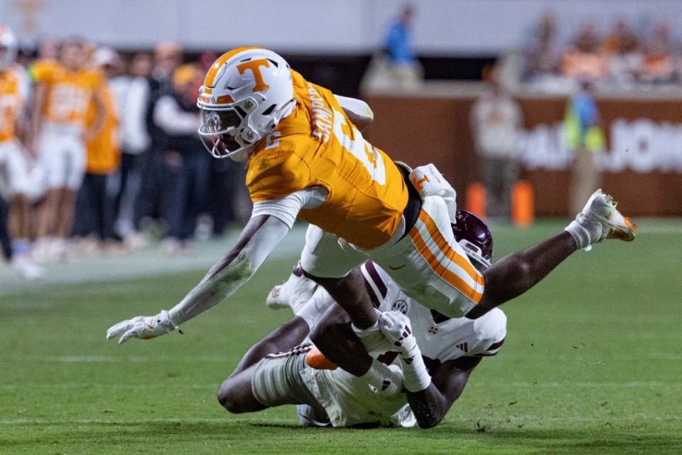 <strong>Tennessee running back Dylan Sampson (6) is tackled by Mississippi State safety Corey Ellington, bottom, during the first half of an NCAA college football game Saturday, Nov. 9, 2024, in Knoxville.</strong> (Wade Payne/AP)