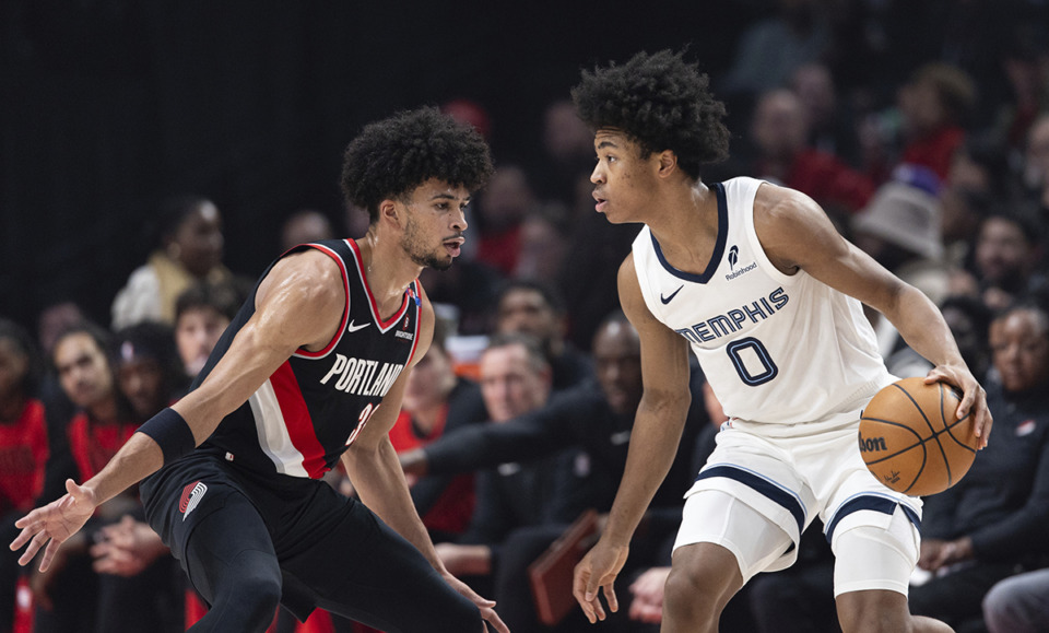 <strong>Memphis Grizzlies forward Jaylen Wells, right, dribbles the ball against Portland Trail Blazers forward Toumani Camara, left, during the first half of an NBA basketball game, Sunday, Nov. 10, 2024, in Portland, Ore.</strong> (Howard Lao/AP Photo)